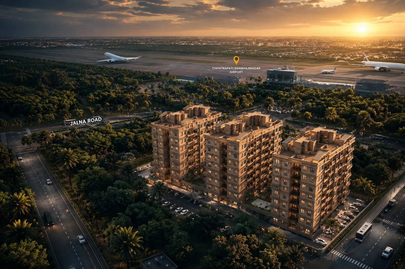 Aerial view of Shubh Labh Heritage's residential towers on Jalna Road, directly opposite Chhatrapati Sambhajinagar Airport with an aircraft on the runway behind.